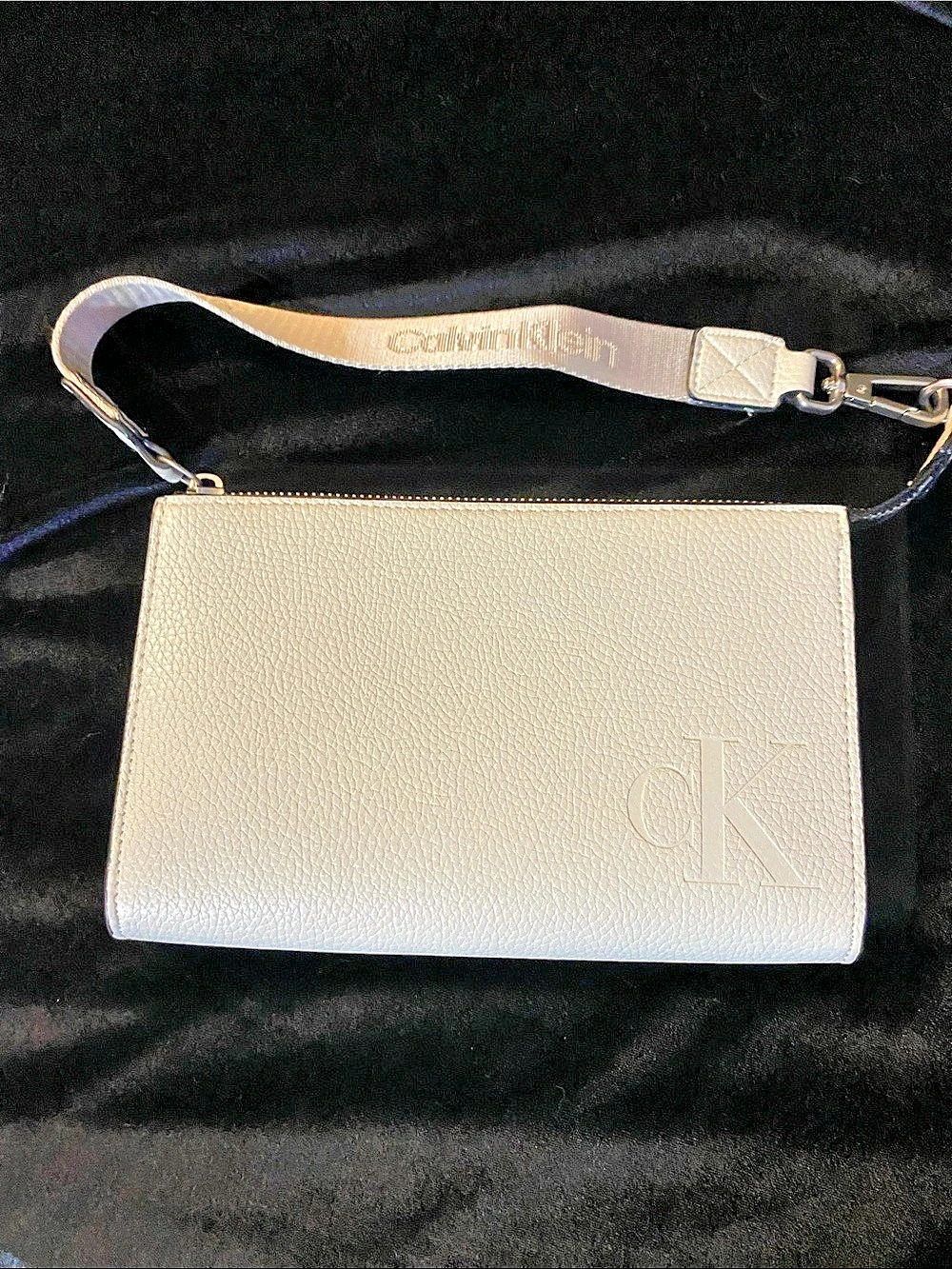 Calvin Klein Wristlet Clutch in Cream